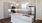 a kitchen with a marble countertop