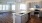 a kitchen with a marble island