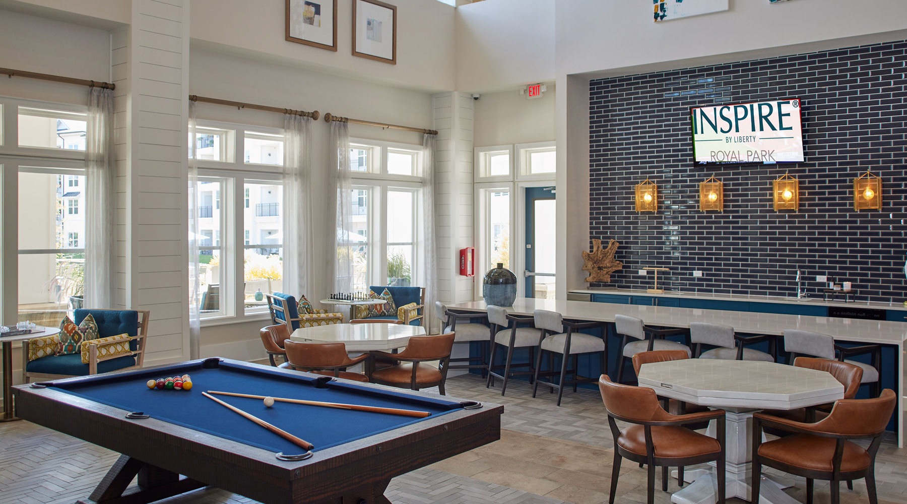 State-of-the-art-Amenities Beautiful clubroom with lounge seating and gaming areas