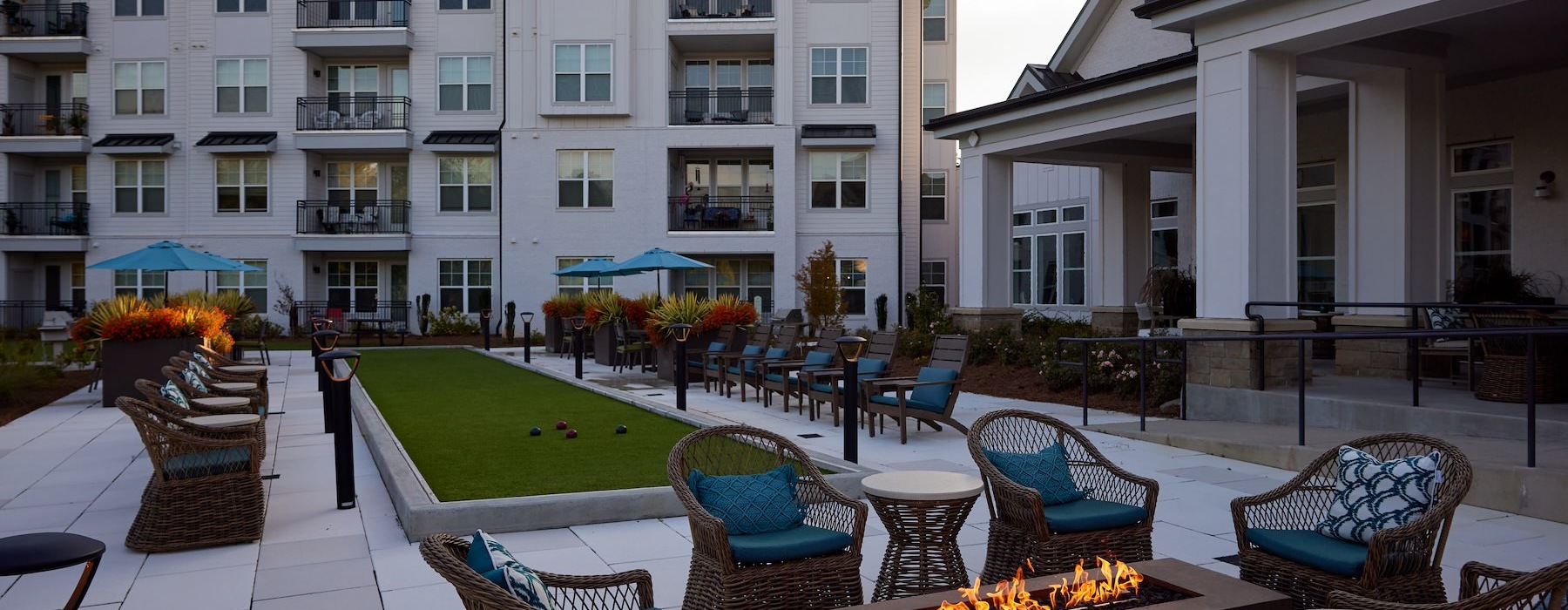 a courtyard with a firepit